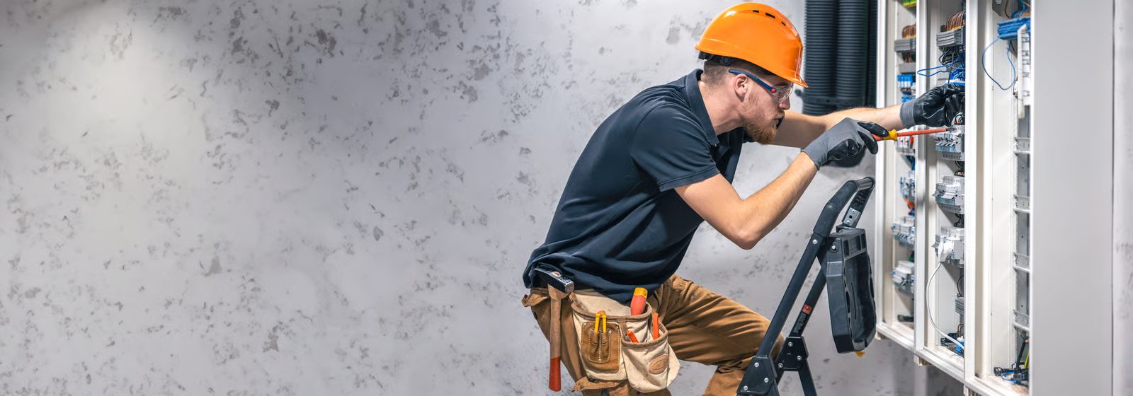 Licensed electrician performing residential electrical work